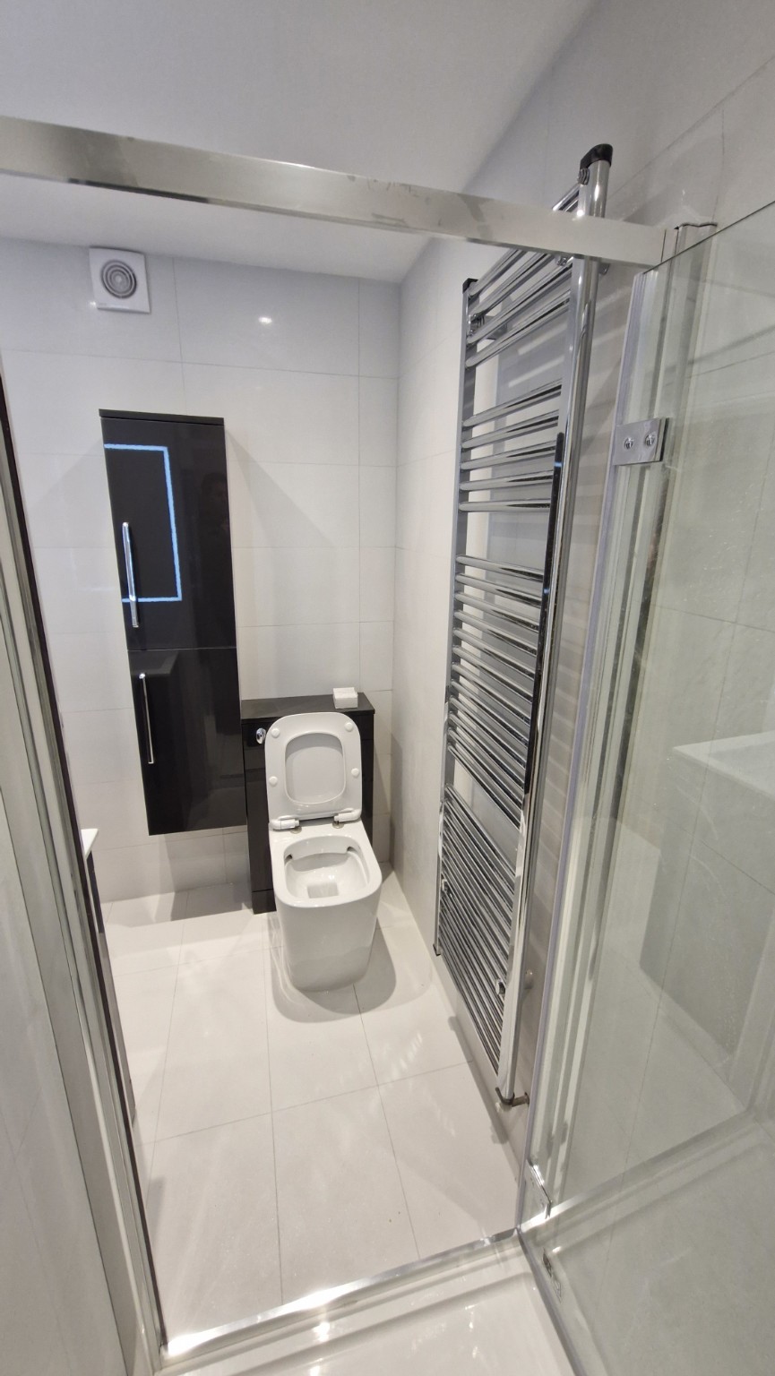 WC and full-height bathroom storage