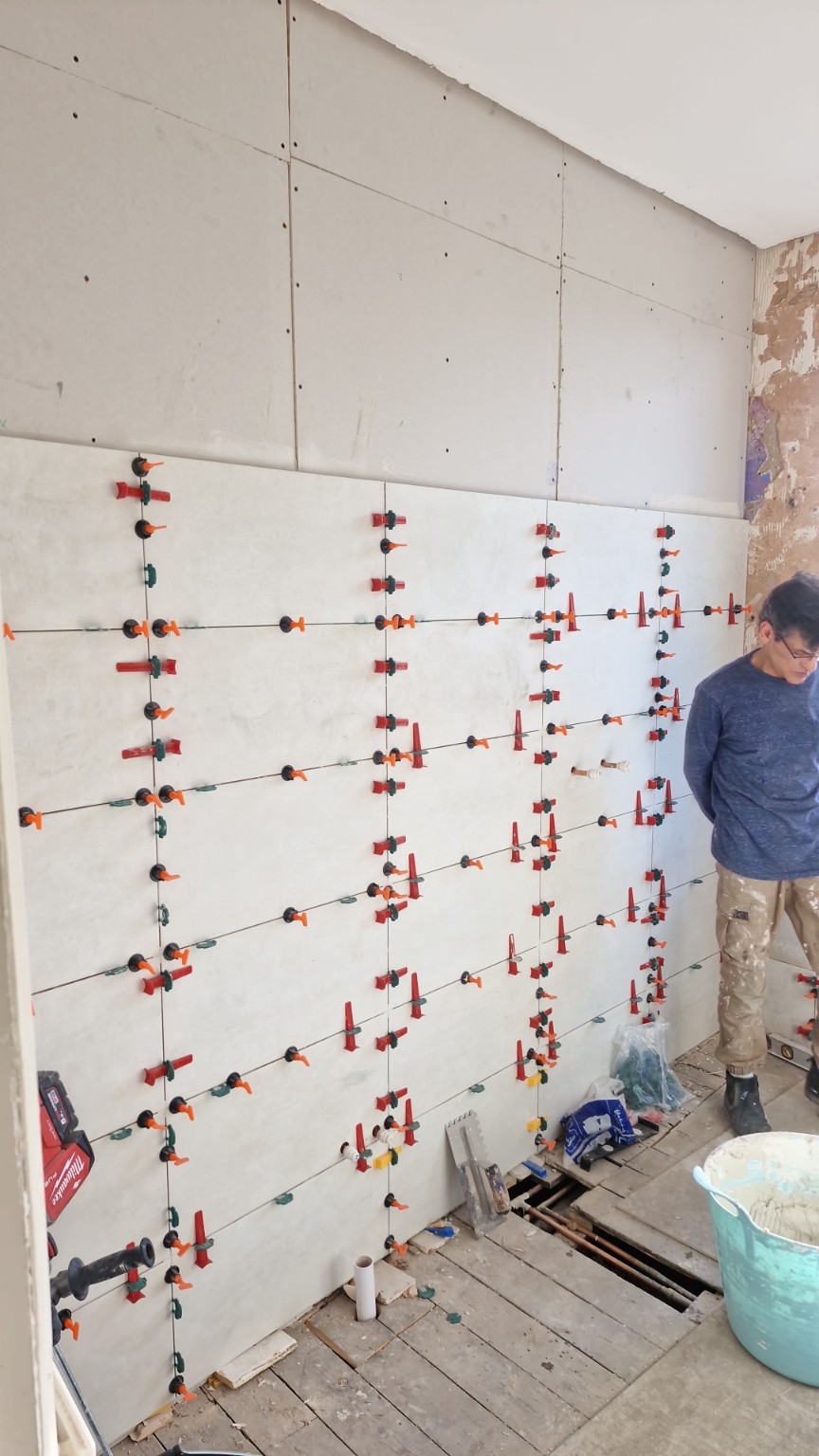 Wall tiling in progress