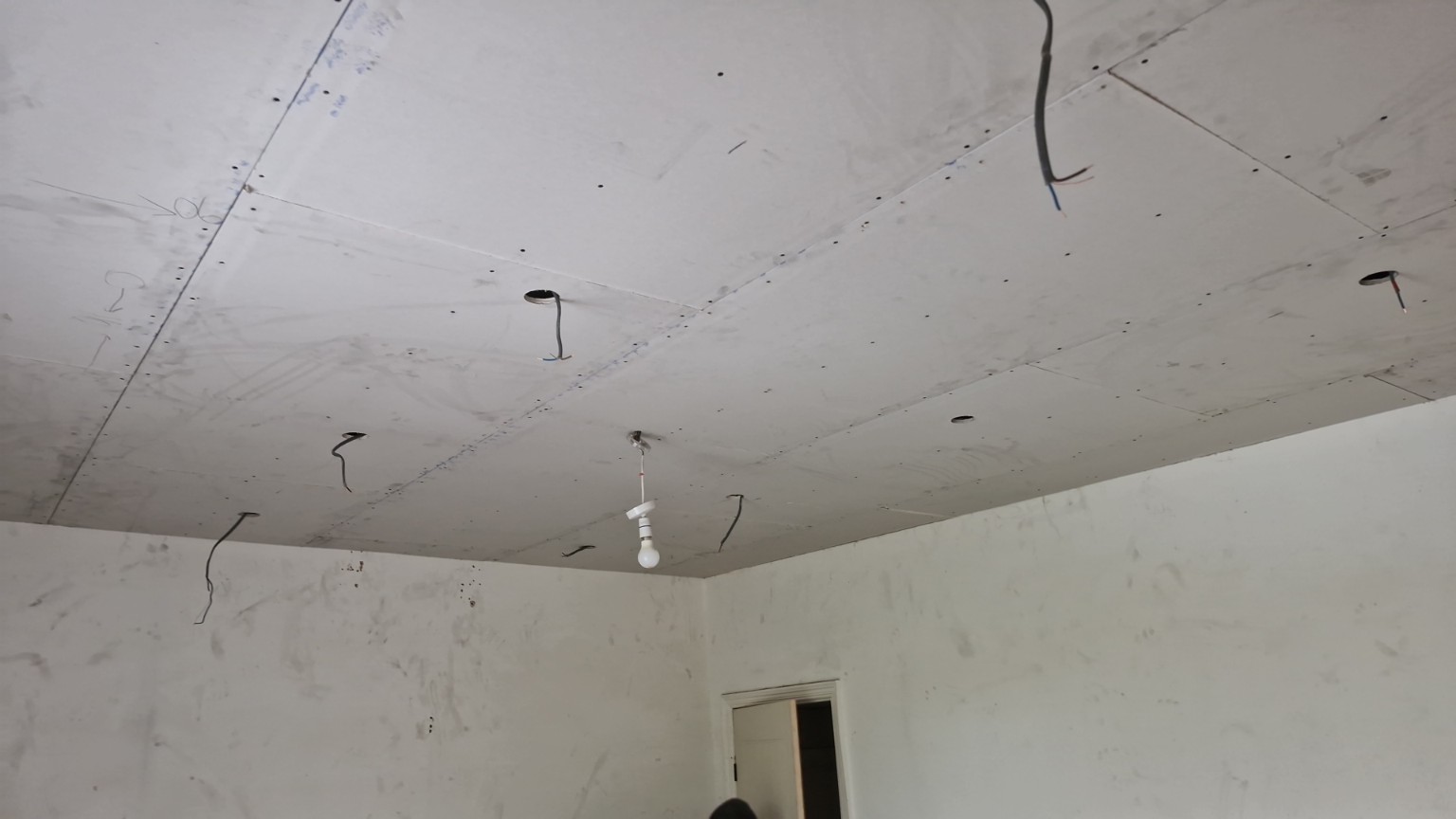 Plasterboard installed with lighting cable positions