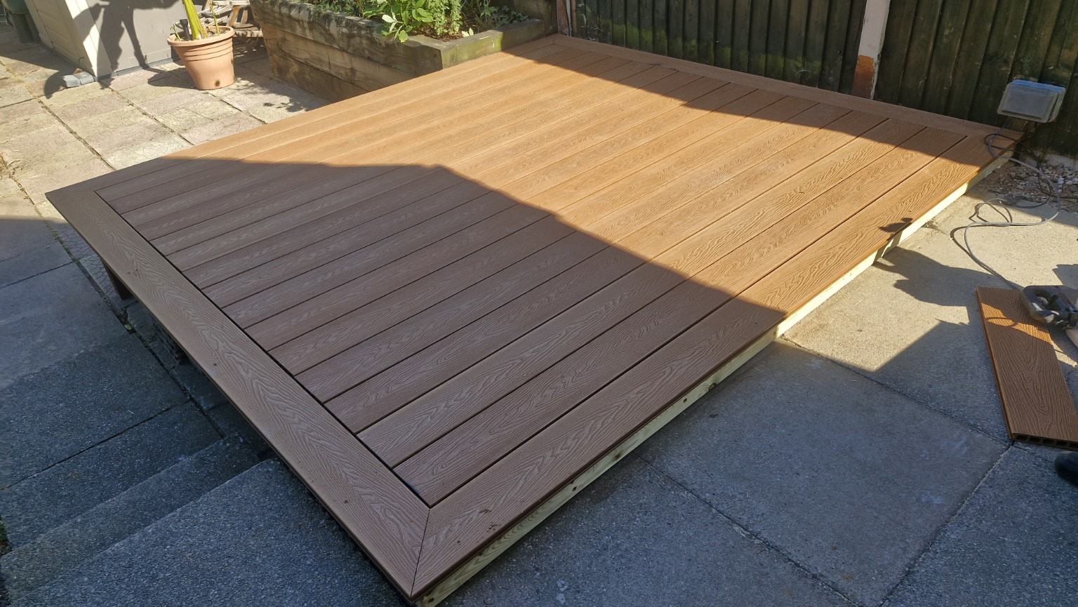 Composite decking boards and border in progress