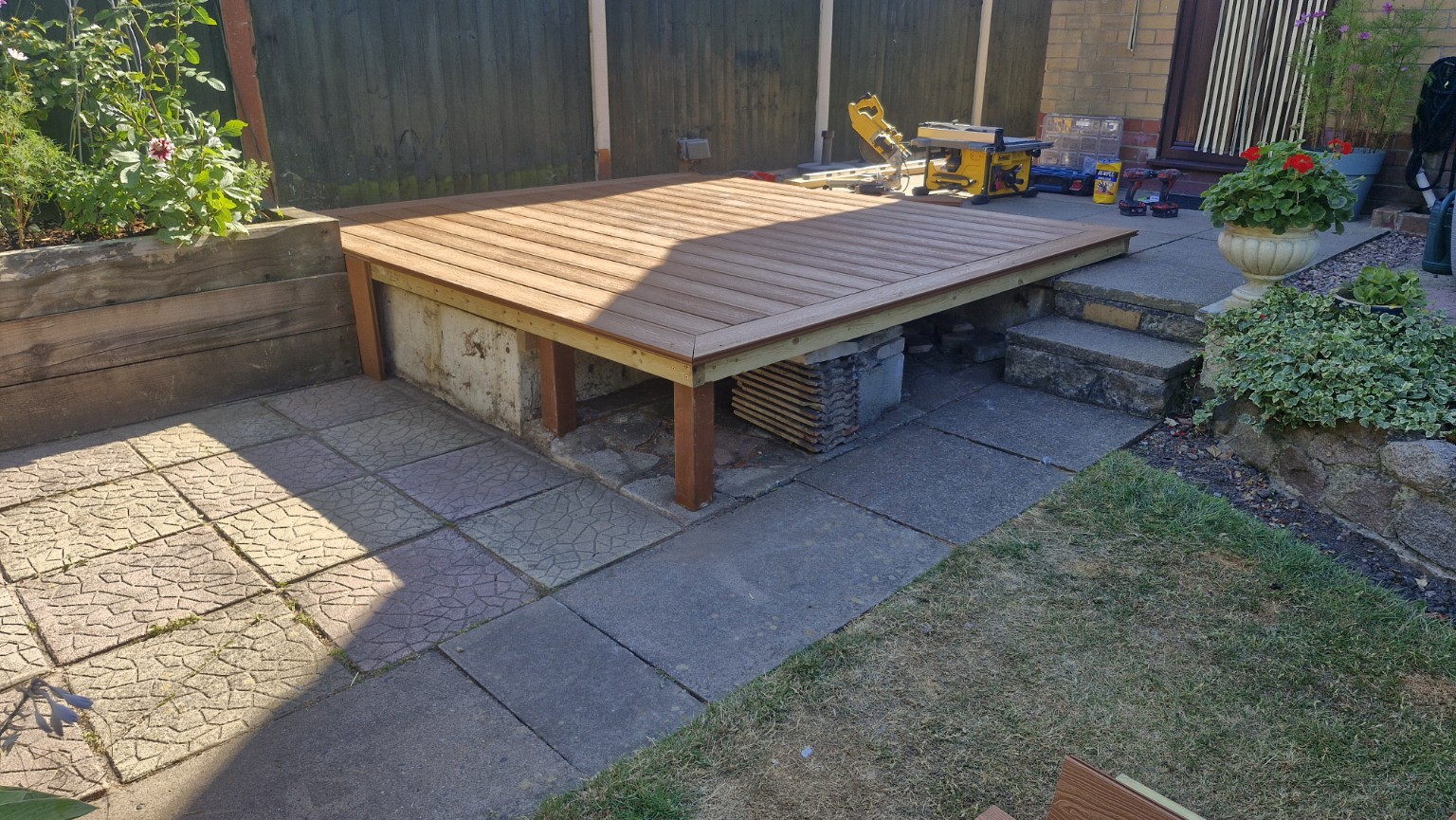 Raised deck surface with supporting frame