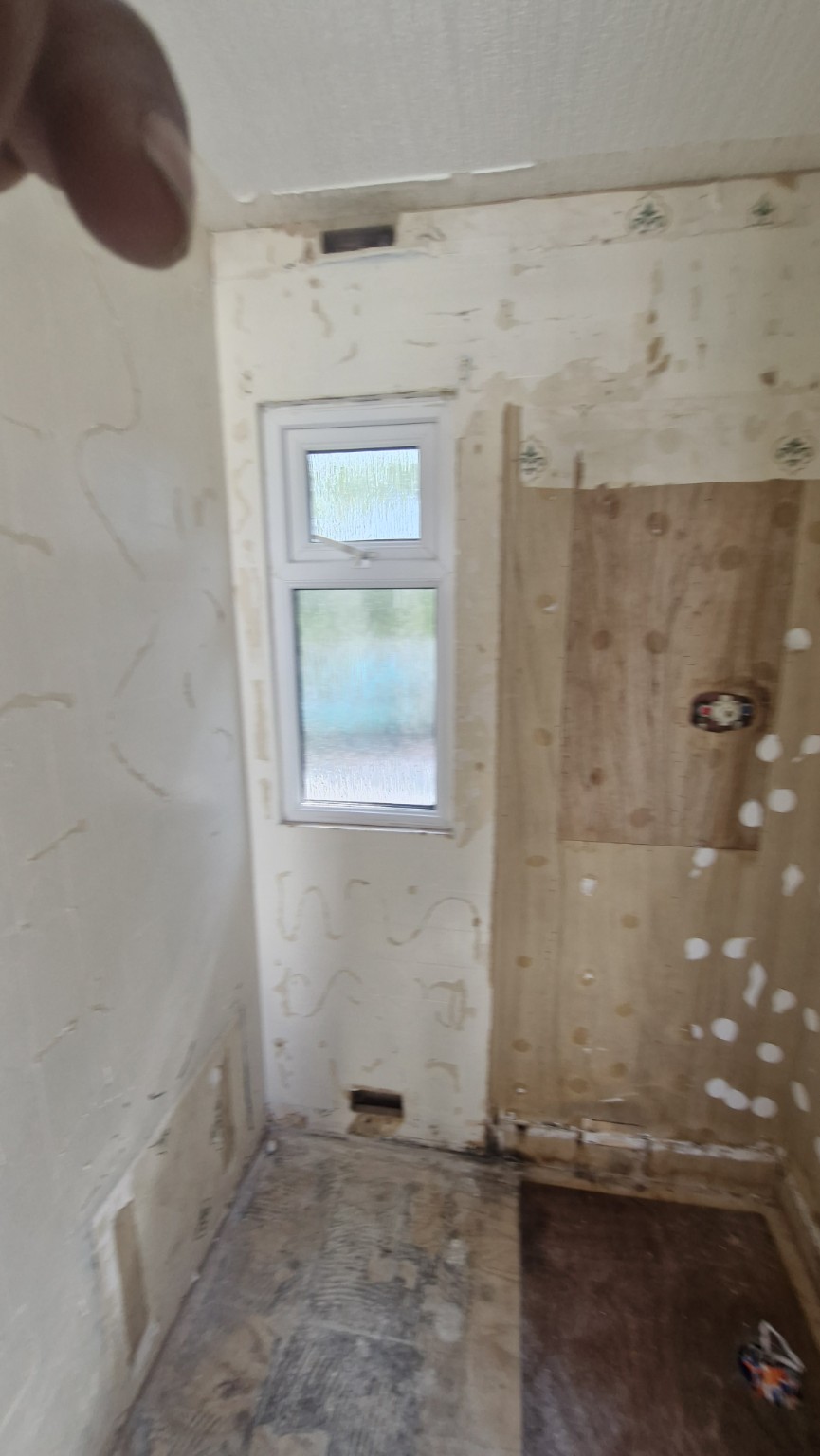 Existing shower room before wall finishes