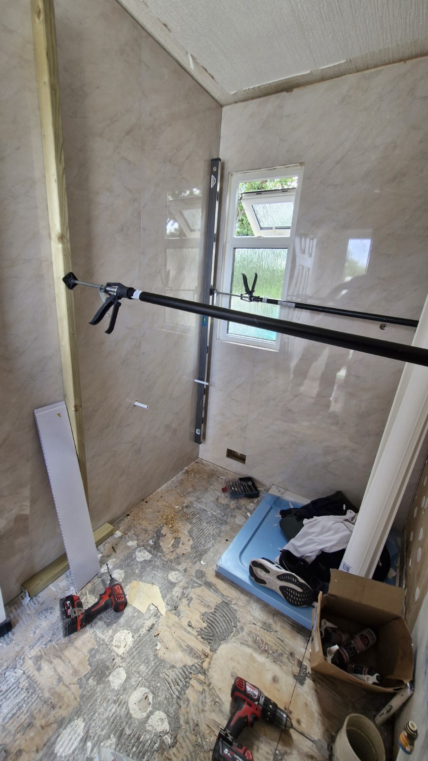 New wall cladding panels being installed
